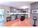 Updated kitchen featuring stainless appliances, central island and granite countertops at 3320 Bryant Ln, Marietta, GA 30066