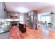 Well-appointed kitchen with stainless steel appliances, island and hardwood floors at 3320 Bryant Ln, Marietta, GA 30066