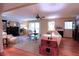 Comfortable living room featuring fireplace, hardwood floors, and bright natural light at 3320 Bryant Ln, Marietta, GA 30066