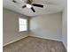 Bedroom featuring carpet floors and natural light at 4397 Windsor Oaks Cir, Marietta, GA 30066