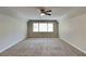 Spacious bedroom featuring neutral paint, plush carpet, and bright windows at 4397 Windsor Oaks Cir, Marietta, GA 30066