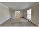 Inviting living room featuring neutral paint and plush carpet at 4397 Windsor Oaks Cir, Marietta, GA 30066