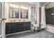 Bathroom featuring a double vanity, tiled floor, and modern fixtures at 4865 Fenbrook Dr, Stone Mountain, GA 30088