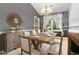 Elegant dining room with stylish decor and a well-lit chandelier at 4865 Fenbrook Dr, Stone Mountain, GA 30088