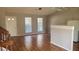 Bright living area with hardwood floors, complemented by white walls and natural lighting at 783 Fox Valley Dr, Stone Mountain, GA 30088