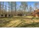 Spacious backyard featuring a storage shed, gazebo, and trampoline at 100 Hall Pl, Fayetteville, GA 30215