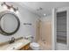 Bathroom featuring a single sink vanity, a toilet, and a stand up shower at 100 Hall Pl, Fayetteville, GA 30215