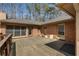 Spacious wooden deck with a brick home exterior, perfect for outdoor entertaining at 100 Hall Pl, Fayetteville, GA 30215