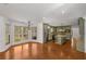 Bright kitchen with an adjacent eating area, stainless steel appliances, and hardwood floors at 100 Hall Pl, Fayetteville, GA 30215