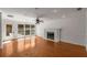 Bright living room with fireplace, hardwood floors, and natural light at 100 Hall Pl, Fayetteville, GA 30215