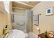 Functional bathroom with a shower/tub combo, neutral color scheme, and ample storage space at 285 Lackland Court, Sandy Springs, GA 30350