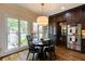 Bright breakfast nook with large windows and custom built-in cabinets with stainless steel appliances at 285 Lackland Court, Sandy Springs, GA 30350