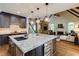 Spacious kitchen with a large island, granite countertops, and modern appliances at 285 Lackland Court, Sandy Springs, GA 30350