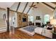 Cozy living room with vaulted ceilings, built-in shelving, and a fireplace at 285 Lackland Court, Sandy Springs, GA 30350