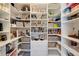 Walk-in pantry includes lots of storage with custom shelving, drawers, baskets, and plenty of room at 285 Lackland Court, Sandy Springs, GA 30350