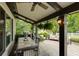 Outdoor patio is perfect for dining or relaxing with a grill, dining table, and comfortable seating at 285 Lackland Court, Sandy Springs, GA 30350