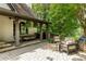 Outdoor patio is perfect for dining or relaxing with a grill, dining table, and comfortable seating at 285 Lackland Court, Sandy Springs, GA 30350