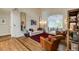 Sunlit playroom with hardwood floors, large windows, and ample space for activities at 285 Lackland Court, Sandy Springs, GA 30350