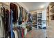 Organized walk-in closet featuring built-in shelving for shoes and clothing at 285 Lackland Court, Sandy Springs, GA 30350