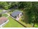 This aerial view showcases the proximity to mature trees, backyard with a swing set, and quiet location at 184 Rambo Sw Pl, Marietta, GA 30064