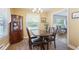 Cozy dining area with hardwood floors and ample natural light, perfect for Gathering meals at 184 Rambo Sw Pl, Marietta, GA 30064