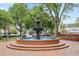 Serene park featuring a beautiful water fountain surrounded by benches and greenery, offering a peaceful retreat at 184 Rambo Sw Pl, Marietta, GA 30064
