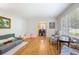 Bright living room with hardwood floors offering a view into a charming dining area at 184 Rambo Sw Pl, Marietta, GA 30064