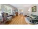 Spacious living room featuring gleaming hardwood floors and plenty of natural light at 184 Rambo Sw Pl, Marietta, GA 30064