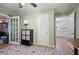 Office space with a door leading to living area and an entry to the kitchen at 184 Rambo Sw Pl, Marietta, GA 30064