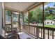 Relaxing screened porch offering scenic views of the backyard and a peaceful outdoor living space at 184 Rambo Sw Pl, Marietta, GA 30064