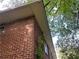 Picture of brick home exterior with trees and vines at 185 W Lake Nw Dr, Atlanta, GA 30314