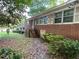 Exterior of brick home with greenery at 185 W Lake Nw Dr, Atlanta, GA 30314