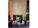 Close-up of a brick fireplace with mantel ready for a new design vision at 185 W Lake Nw Dr, Atlanta, GA 30314