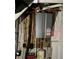 The water heater of the home, connected to various pipes at 185 W Lake Nw Dr, Atlanta, GA 30314