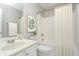 Fresh bathroom features a shower and tub combination with modern fixtures at 2447 Stancrest Ln, Lawrenceville, GA 30044