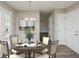 Bright eat-in kitchen featuring stainless appliances, modern cabinets, and updated flooring at 2447 Stancrest Ln, Lawrenceville, GA 30044
