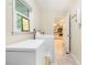 Laundry room equipped with a washer, dryer, and ample counter space at 5170 Oxbow Rd, Stone Mountain, GA 30087