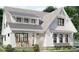 Charming two-story home with white siding, black windows, covered porch and inviting curb appeal at 6821 Phillips Mill Rd, Douglasville, GA 30135