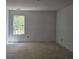 Bright room with a natural view, ready for personalization and finishing touches at 6821 Phillips Mill Rd, Douglasville, GA 30135