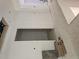 Unfinished room offers a peek into adjacent rooms, ready for customization at 6821 Phillips Mill Rd, Douglasville, GA 30135