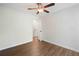 Bedroom with ceiling fan, hardwood floors and white trim offers a bright and inviting space at 1857 Barrington Ct, Marietta, GA 30066