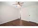 Bedroom with ceiling fan, hardwood floors and white trim offers a bright and inviting space at 1857 Barrington Ct, Marietta, GA 30066