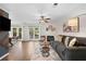 This home's living room has wood floors, a fireplace, and French doors for lots of natural light at 1857 Barrington Ct, Marietta, GA 30066