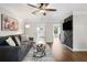 Comfortable living room featuring modern decor, fireplace, and a seamless flow into other areas at 1857 Barrington Ct, Marietta, GA 30066
