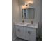 Modern bathroom features double sinks, white cabinets and gold accents at 2131 Glendale Dr, Decatur, GA 30032