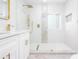 Sleek, renovated bathroom featuring a double sink vanity and a frameless glass shower at 2131 Glendale Dr, Decatur, GA 30032