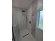 Luxurious shower with gold hardware, rain shower head, and glass partition at 2131 Glendale Dr, Decatur, GA 30032