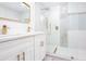 Sleek, renovated bathroom featuring a double sink vanity and a frameless glass shower at 2131 Glendale Dr, Decatur, GA 30032