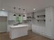 Modern kitchen features an island, stainless steel appliances, and ample cabinet space at 2131 Glendale Dr, Decatur, GA 30032