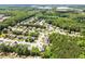 Aerial view of a neighborhood surrounded by lush greenery at 2173 Beacon Crest Dr, Buford, GA 30519